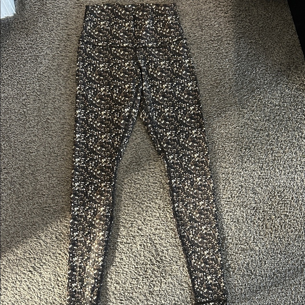 lululemon athletica Black and Gold Patterned Leggings NWOT